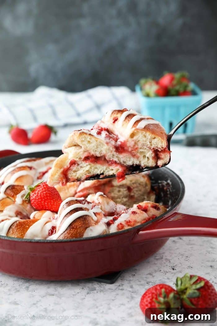 Layers of fruit and jam are all twisted up in this Strawberry Swirl Bread, topped with a sweet glaze.