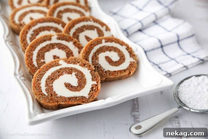 Sweet Swirls: Carrot Cake Roll Recipe 7 A freshly rolled Carrot Cake Roll, ready for chilling and slicing, a classic Easter dessert with spiced carrot cake and rich cream cheese frosting.