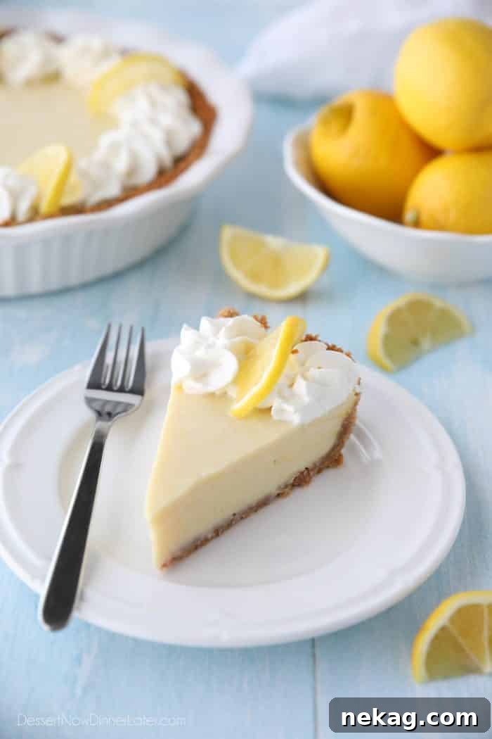 Lemon Cream Pie, a tangy and sweet dessert with a buttery graham cracker crust, similar to key lime pie but made with lemons and topped with fresh whipped cream.