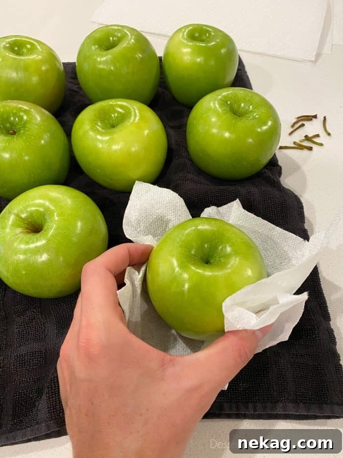 Handcrafted Caramel Apple Delights 4 For caramel apples: Wash, rinse, and dry the apples completely. Remove stems before adding handles.