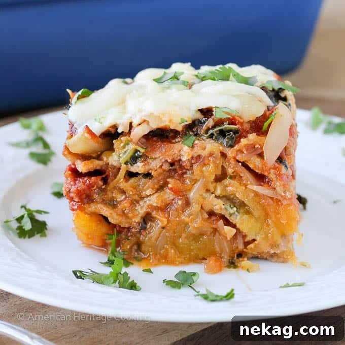 Delicious Spaghetti squash lasagna topped with fresh herbs, ready to be served.