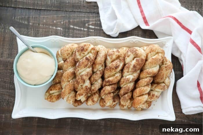 Top view of plate of baked cinnamon twists.