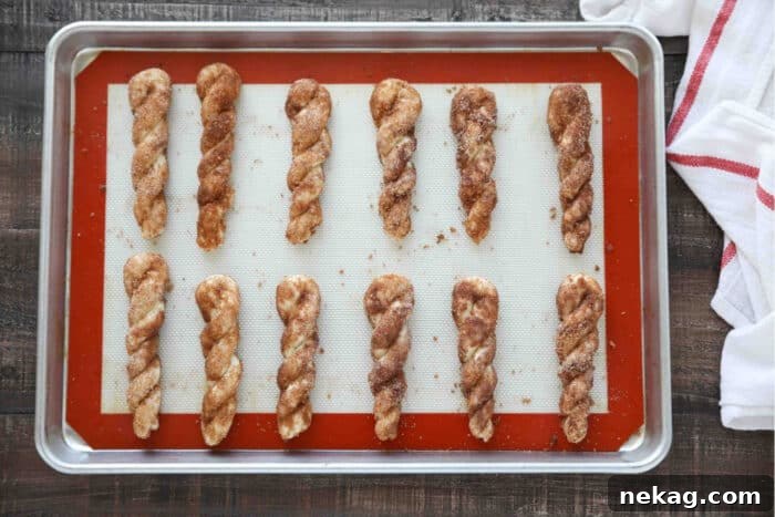 Cinnamon Twists prepared on sheet tray prior to baking.