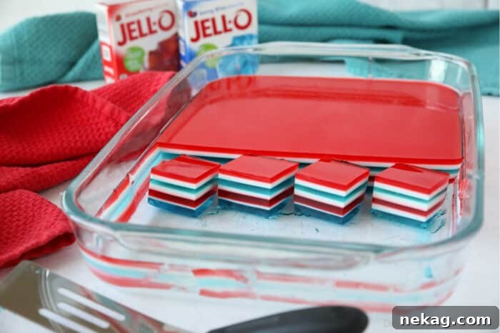 Tri-Color Celebration Jell-O 11 Patriotic jello with red, white, and blue colors in a 13x9 dish.