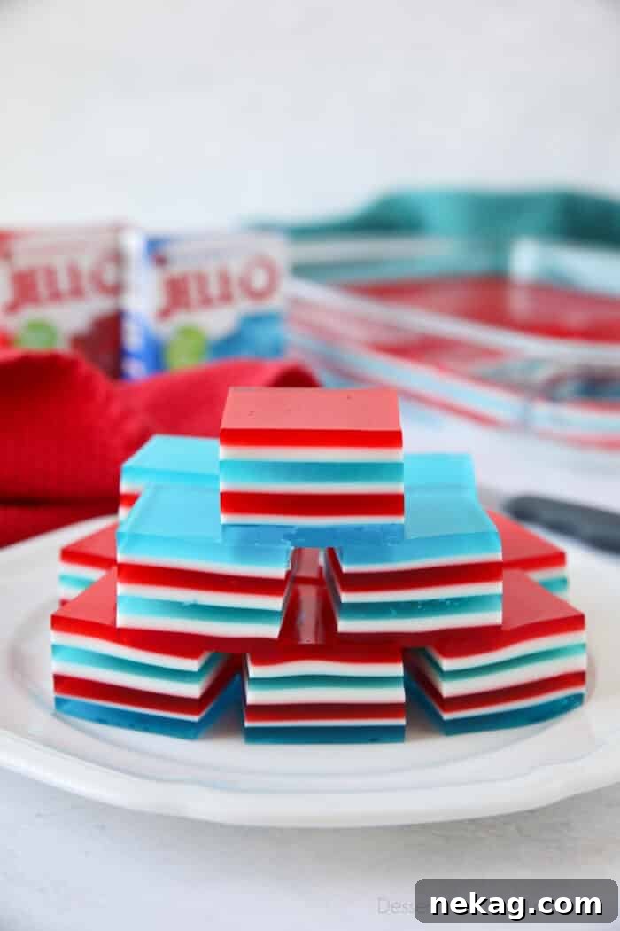 Tri-Color Celebration Jell-O 3 Red, white, and blue finger jello on a plate.