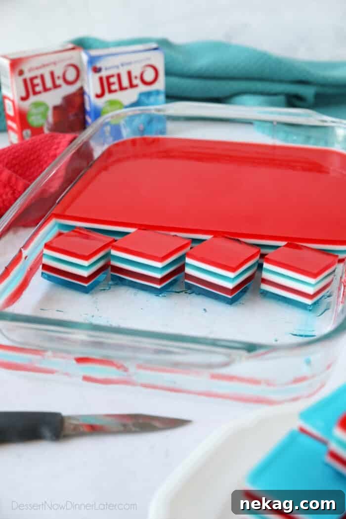 Tri-Color Celebration Jell-O 4 Red, white and blue layered jello cubes in dish.