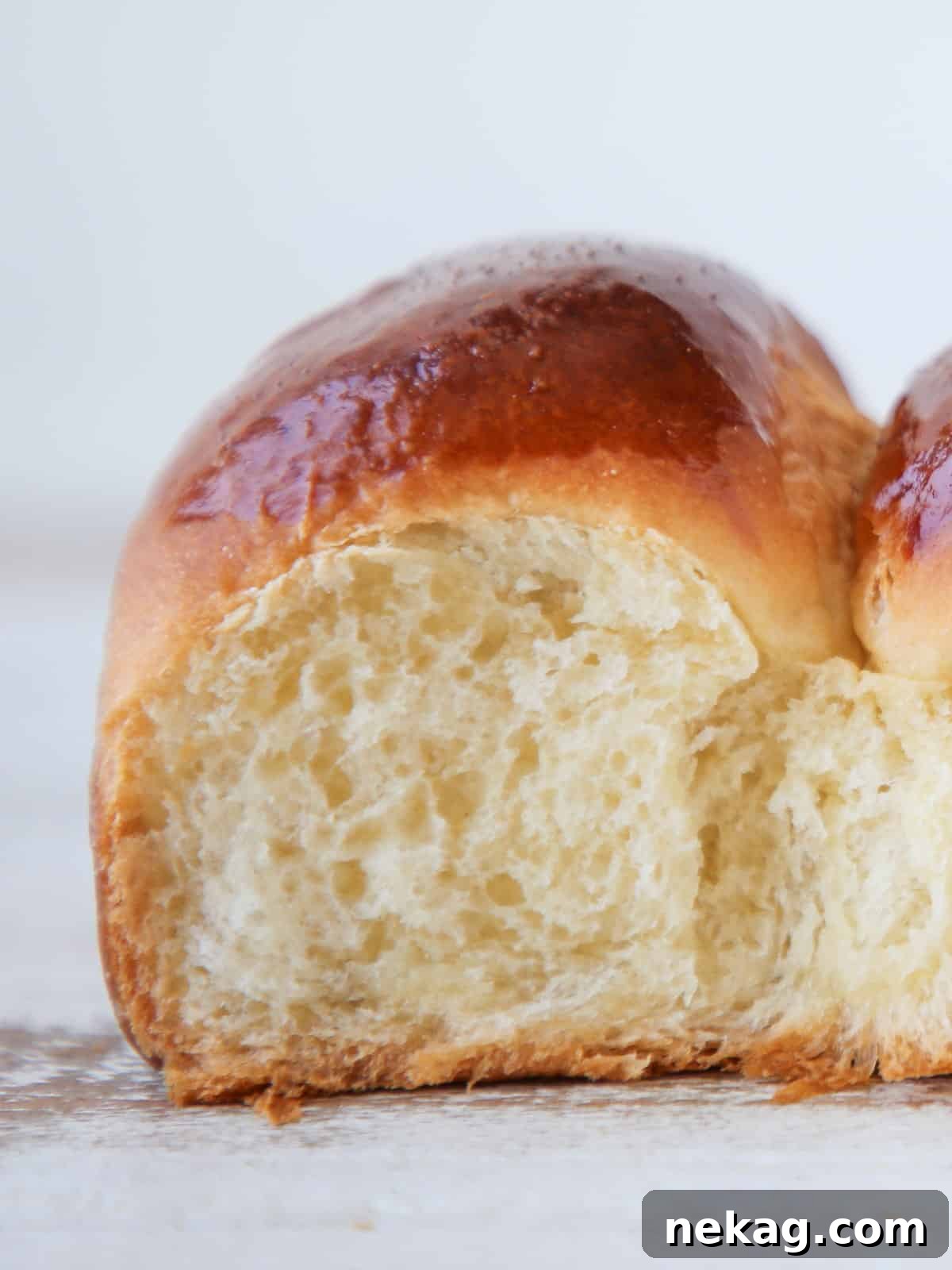 Perfectly Simple Dinner Rolls 4 Freshly baked easy dinner rolls brushed with butter.