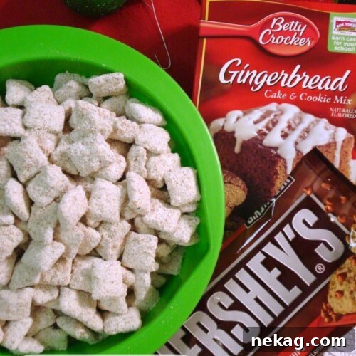 Festive Gingerbread Crunch 4 The finished Gingerbread Puppy Chow in a white bowl, ready to be served as a delightful holiday snack.