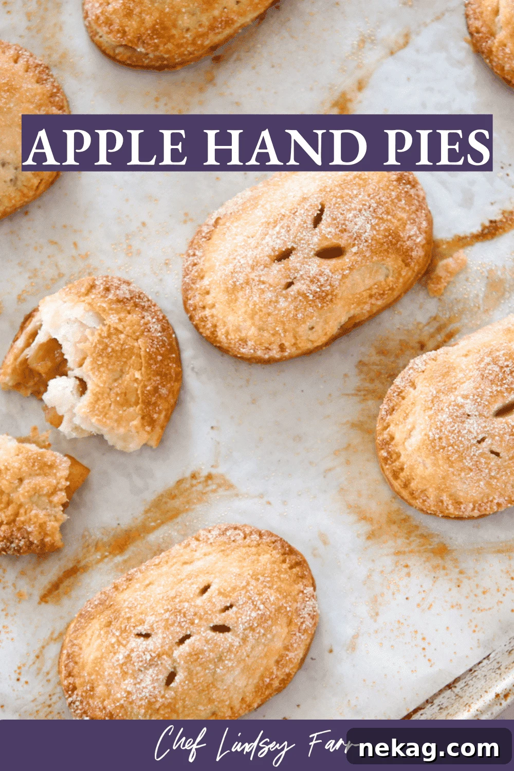 Apple Hand Pies on parchment paper, ready for baking.