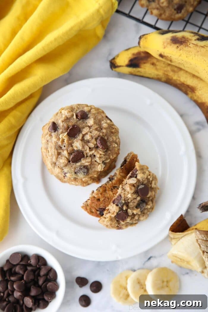 Banana Bread Inspired Oatmeal Chocolate Chip Cookies 4 A plate filled with delicious banana oatmeal chocolate chip cookies, ready to be enjoyed.