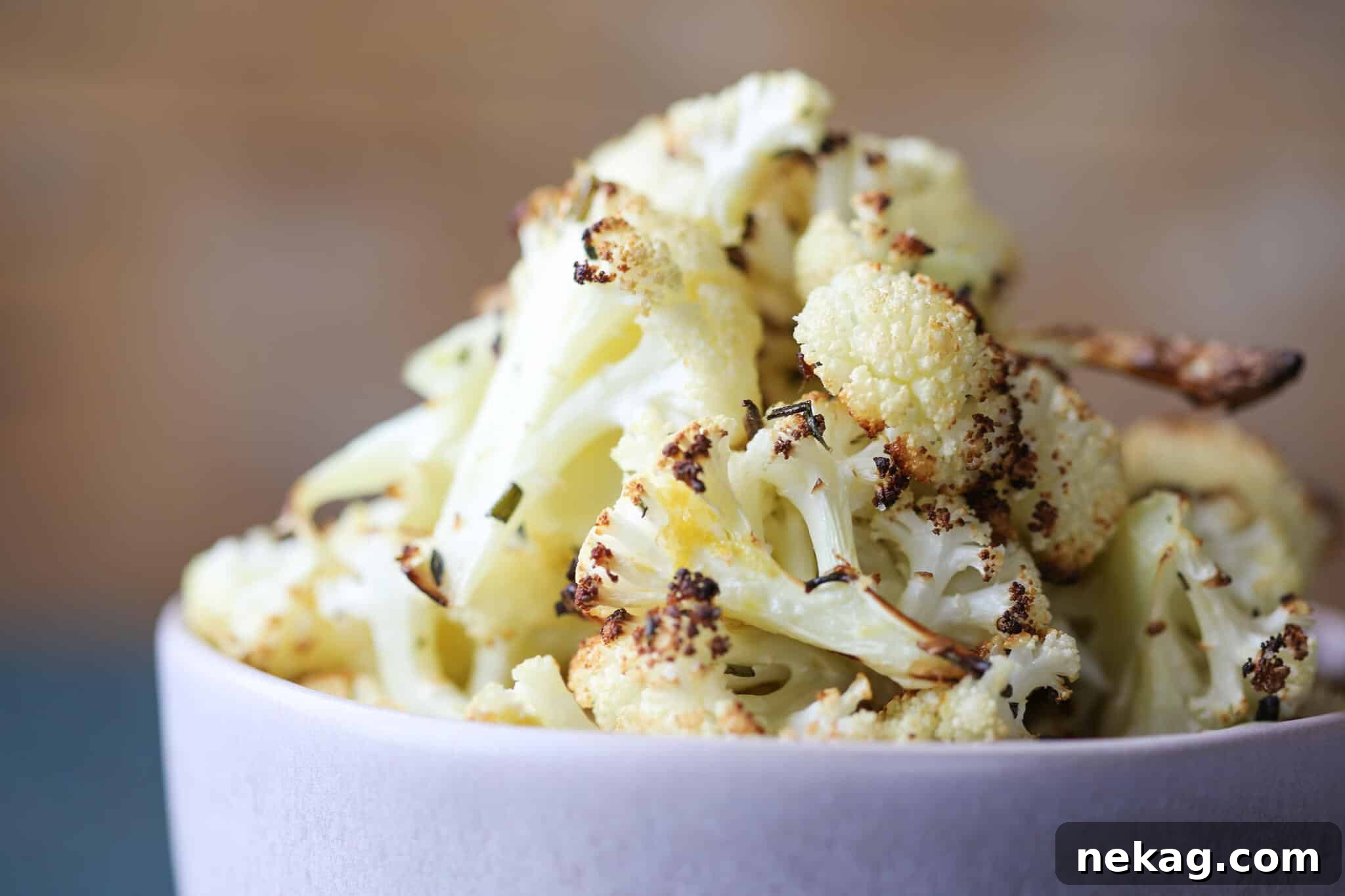 Easy Rosemary Lemon Roasted Cauliflower pink bowl