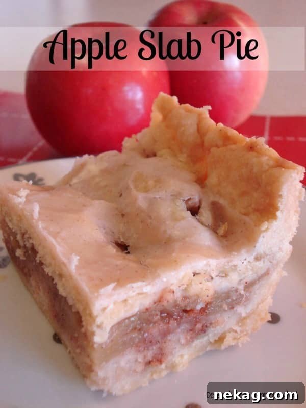 Golden Apple Slab Bake 13 A perfectly square piece of apple slab pie on a white plate, highlighting its neat presentation.