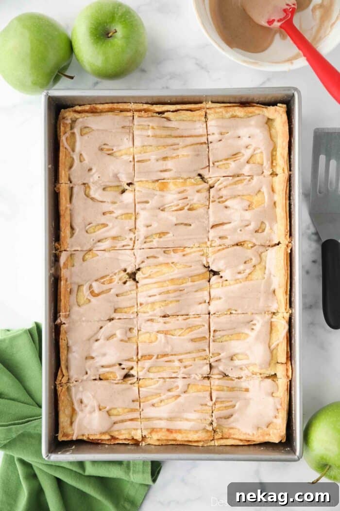 Golden Apple Slab Bake 3 Large apple slab pie in a 9x13 inch pan, generously coated with a glistening maple glaze.
