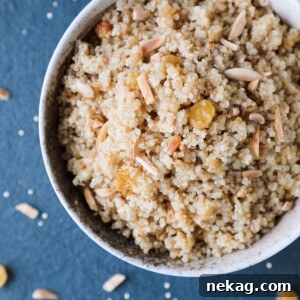 Quinoa Pilaf served in a bowl, garnished with fresh herbs, a delightful presentation