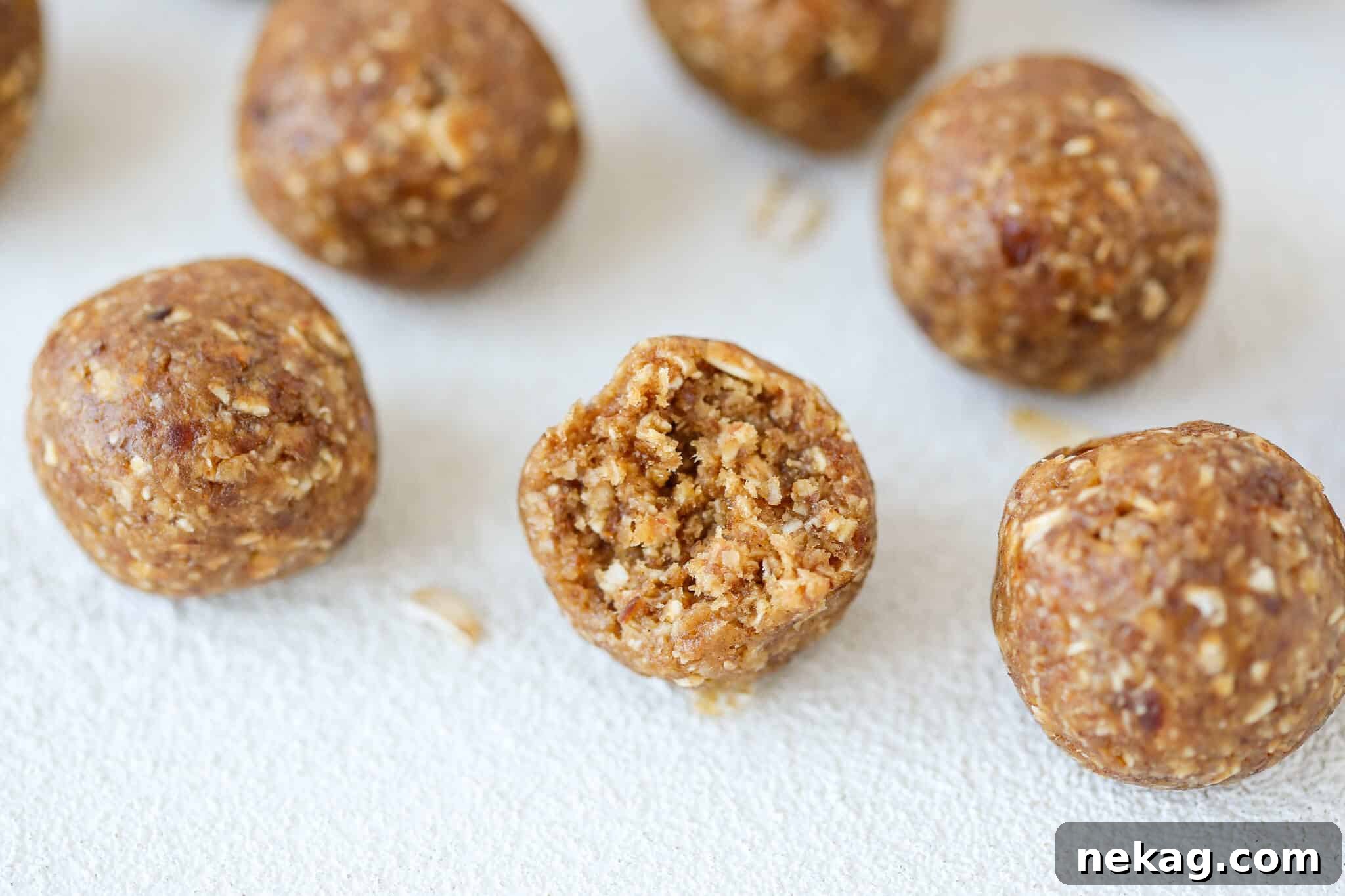 Peanut Butter Banana Fuel Bites 4 Close-up interior view of a Peanut Butter Banana Energy Bite, showcasing its wholesome ingredients and chewy texture.