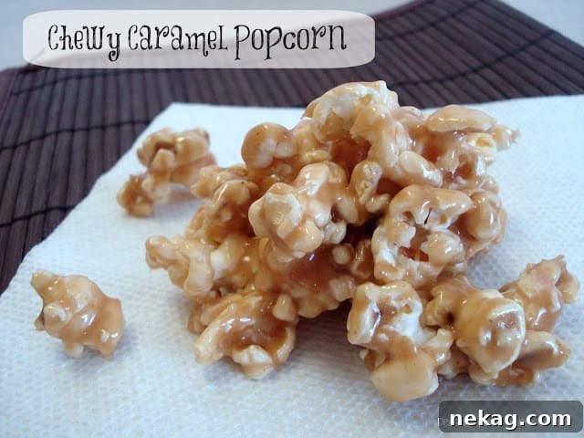 Dreamy Caramel Popcorn 9 Soft and chewy homemade caramel popcorn elegantly arranged on a white napkin, ready for a bite.