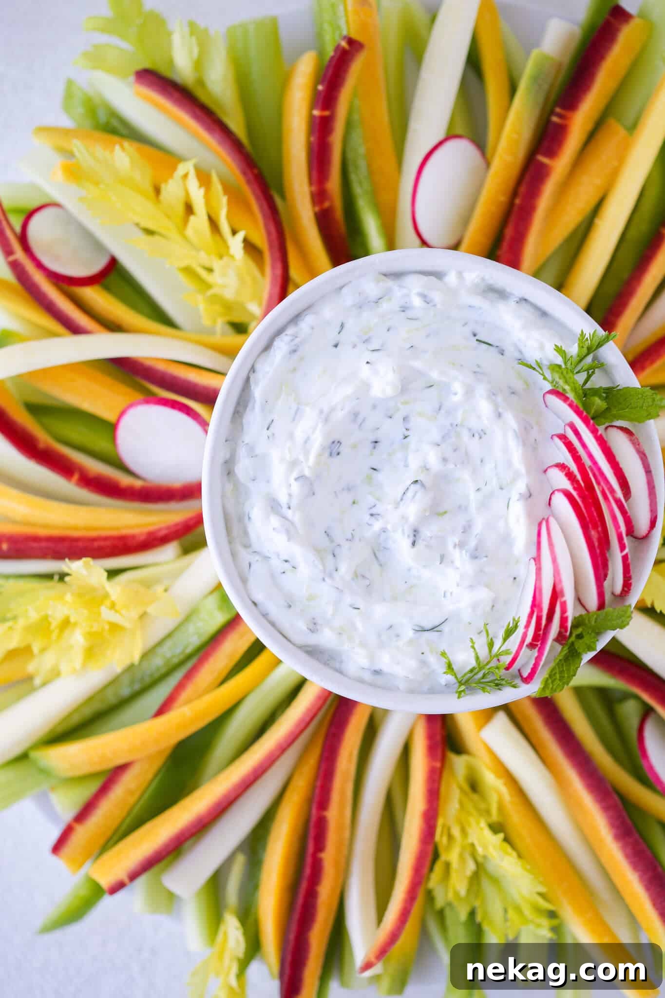 Tzatziki Dip Garnished with fresh herbs and a drizzle of olive oil