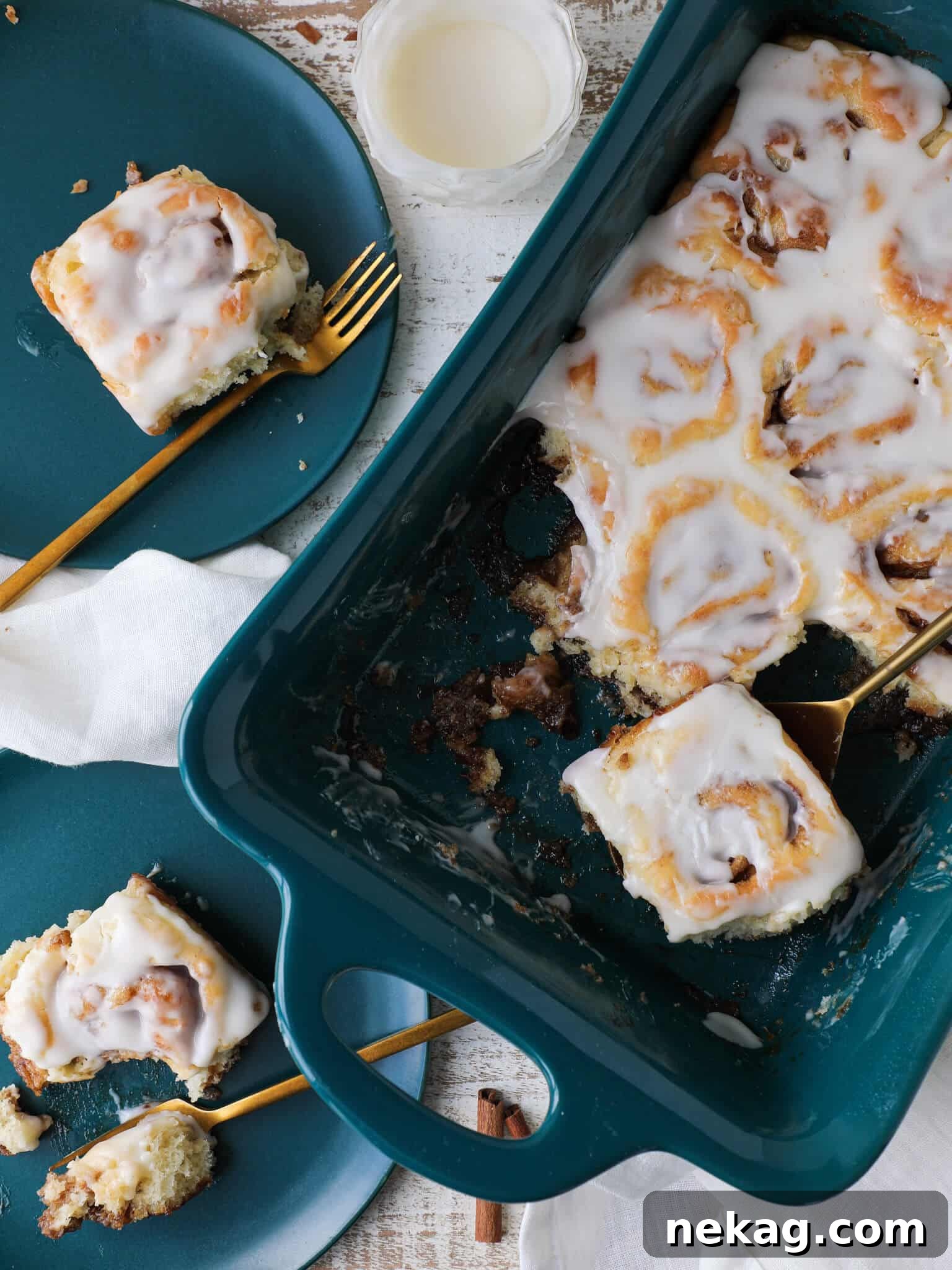 Irresistible Cream Cheese Cinnamon Rolls 7 A festive tablescape featuring a platter of the best homemade cinnamon rolls, ready to be enjoyed.