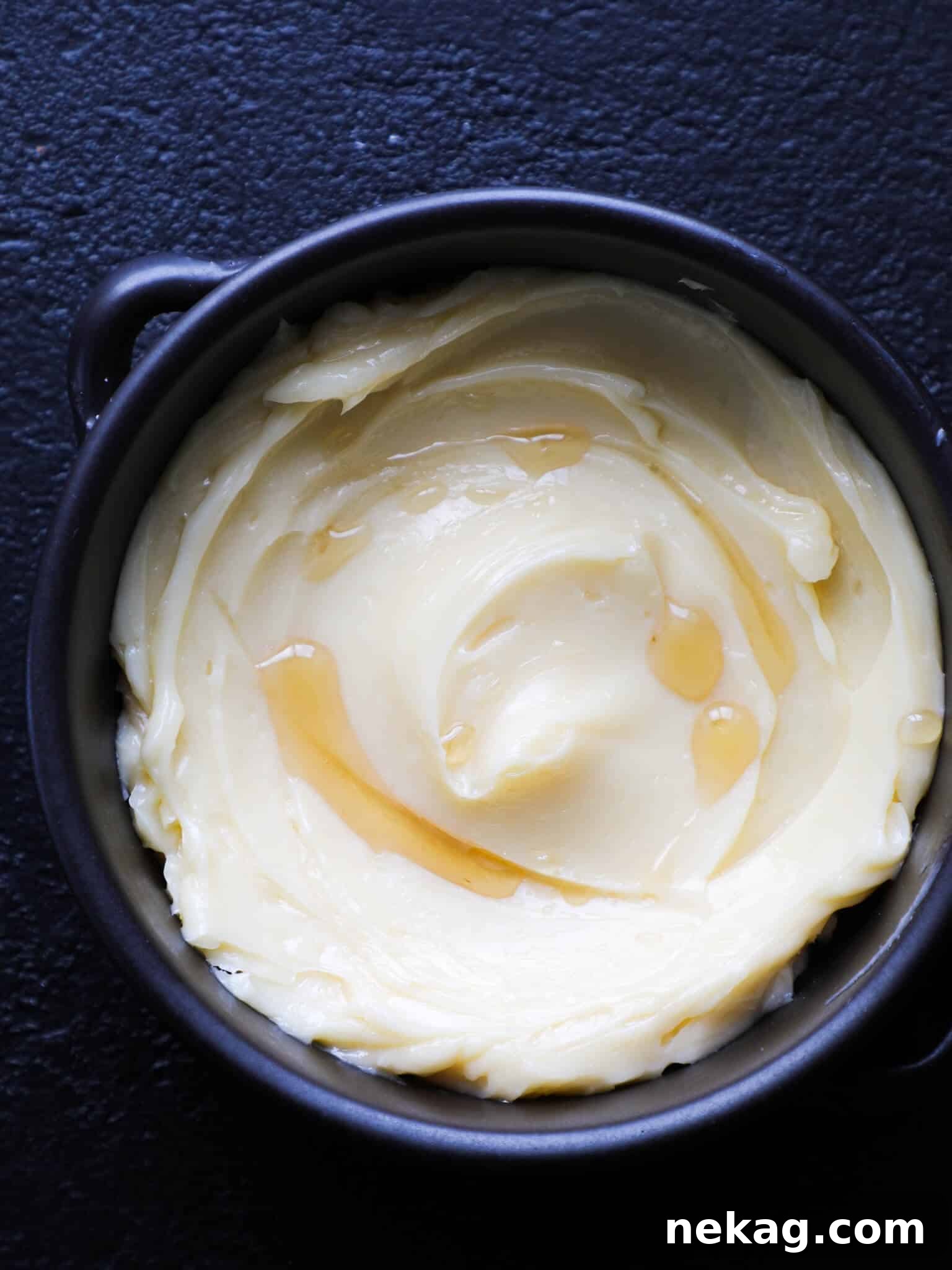 Whipped Maple Butter 2 Rich Maple Butter in a black bowl, ready to be spread