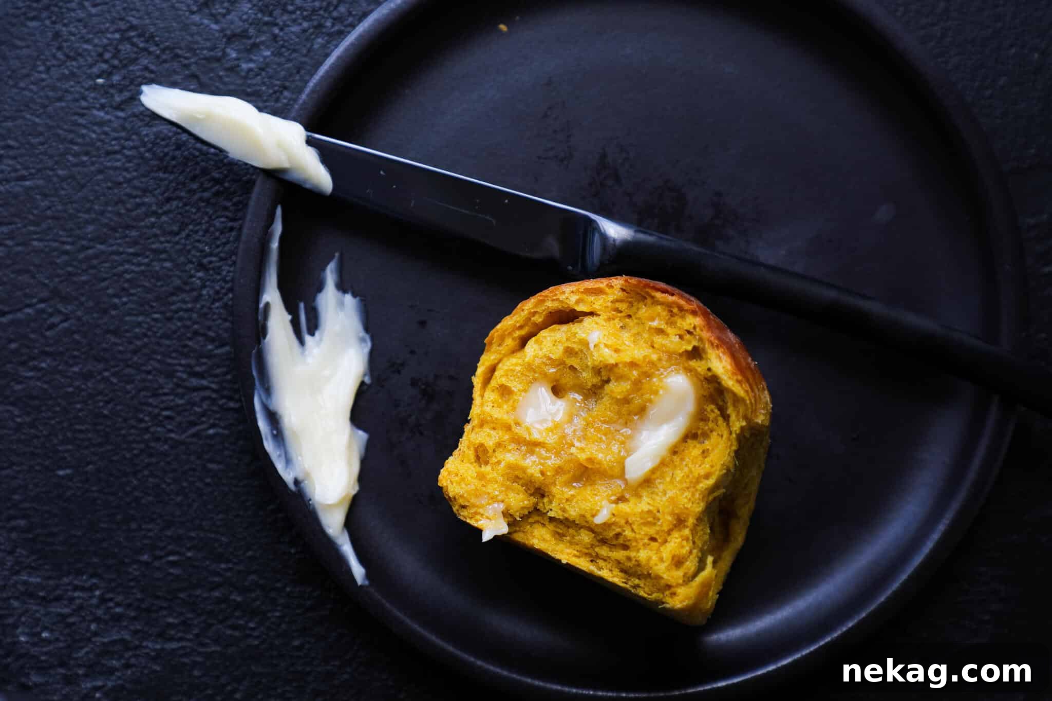 Whipped Maple Butter 3 Maple Butter generously spread on a warm pumpkin spice roll