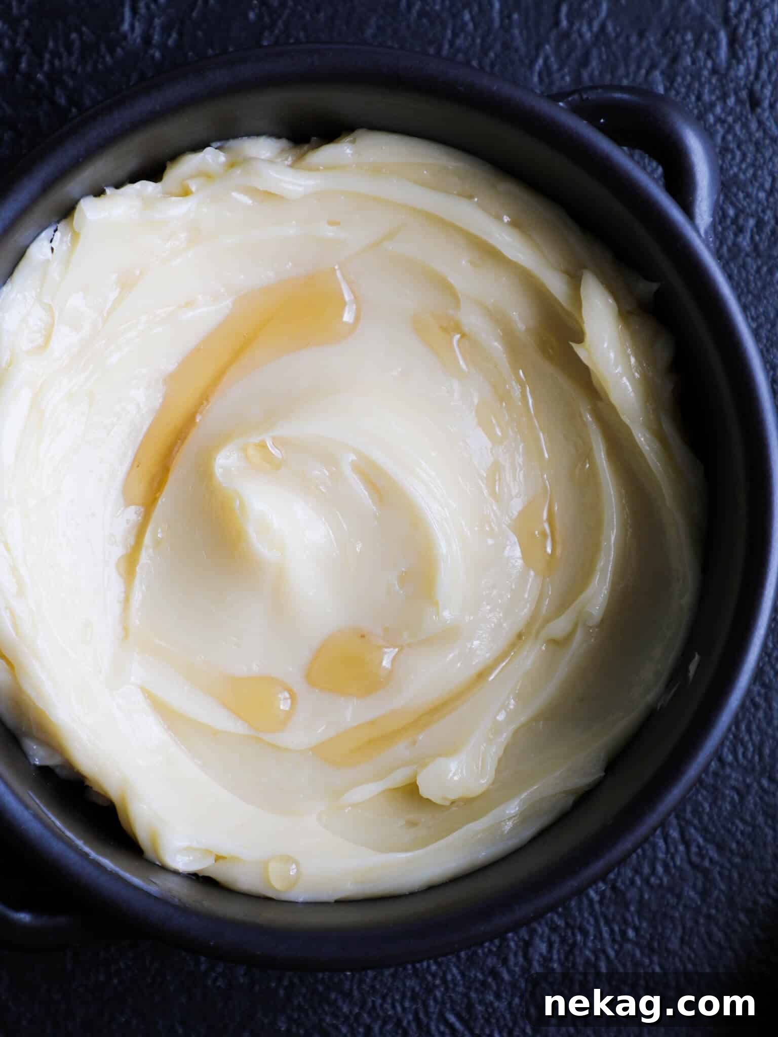 Whipped Maple Butter 4 Maple Butter in a bowl with dark shadows, emphasizing its rich texture