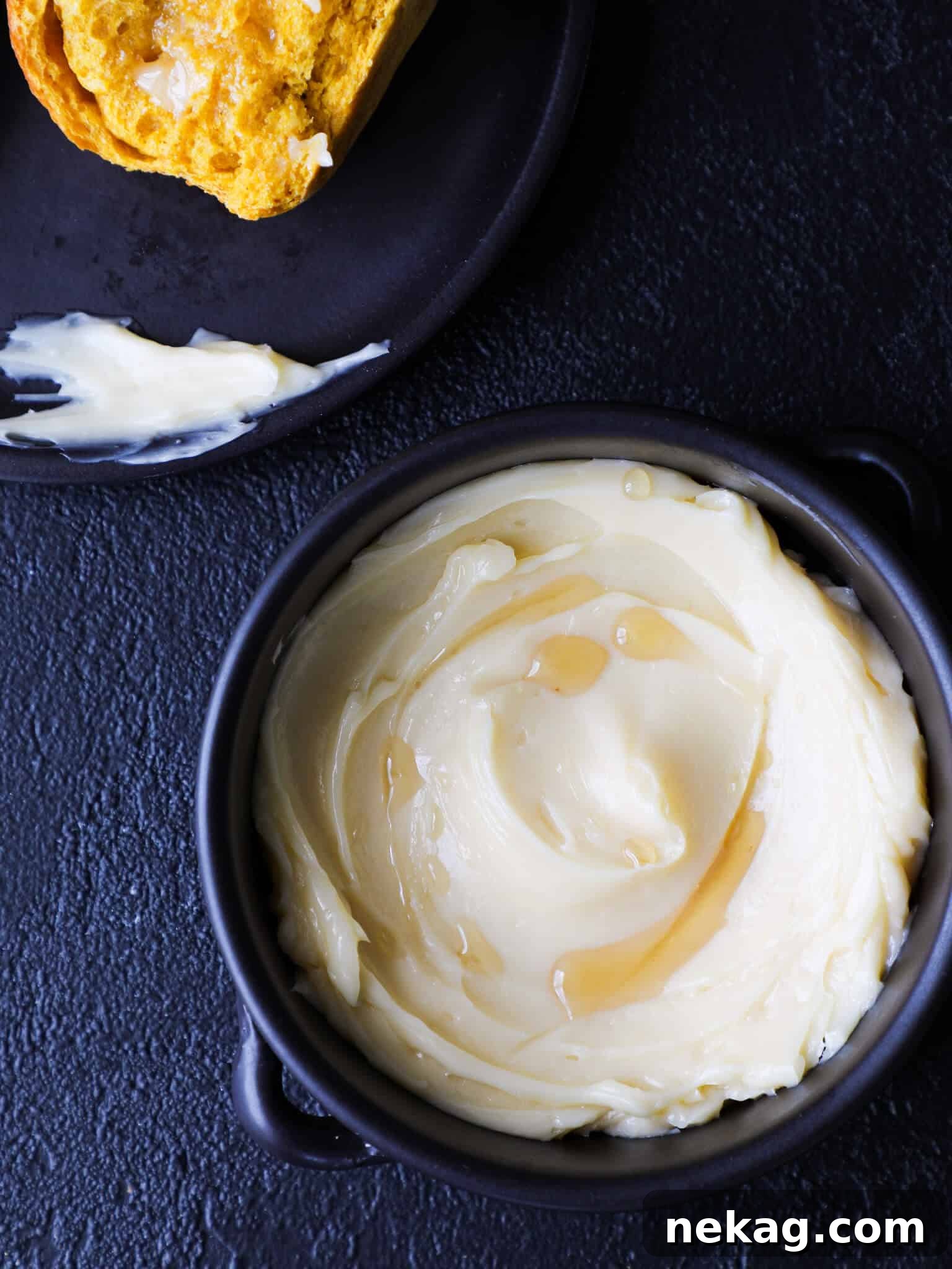 Whipped Maple Butter 5 Maple Butter in a bowl with a drizzle of maple syrup over it