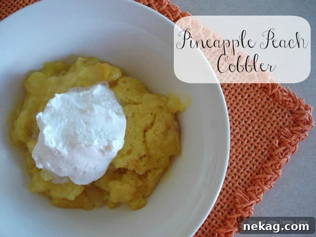 Baked Pineapple Peach Cobbler with golden topping