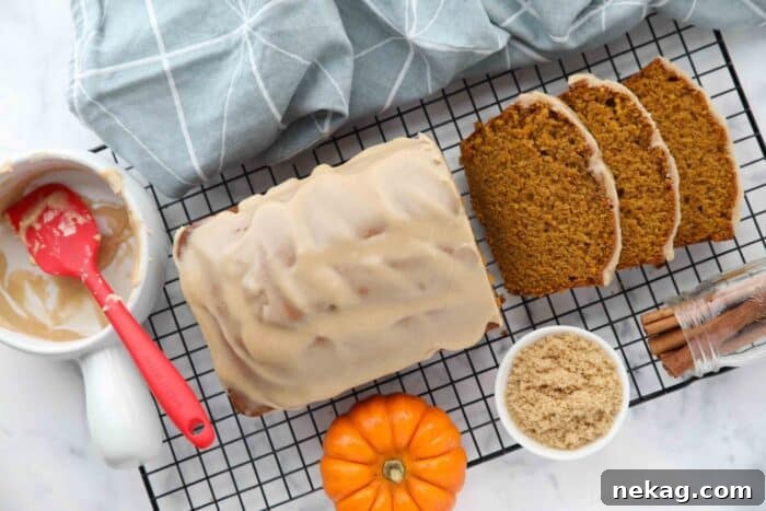 Golden Cinnamon Drizzle 8 Pumpkin bread with cinnamon brown sugar glaze on top.