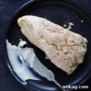 Spiced Apple Scones with perfect cream on top, ready to serve.