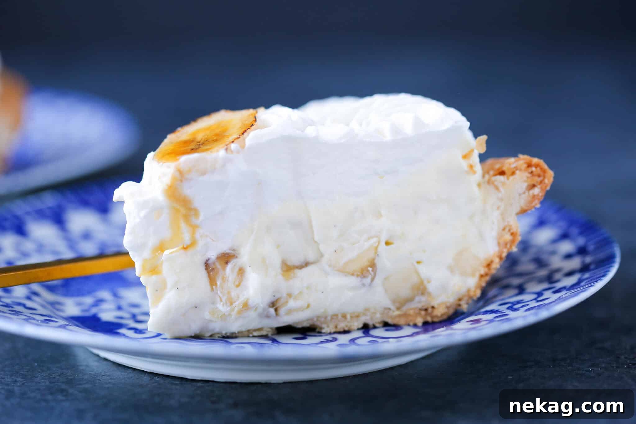 Flawless Crusts The Docking Dilemma Solved 4 A slice of banana cream pie with a perfectly baked, crisp crust, demonstrating the results of proper docking.