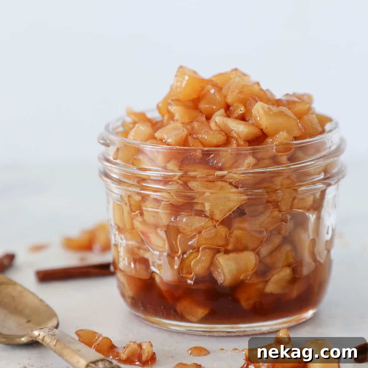 Effortlessly Delicious Apple Compote 3 Easy Apple Compote stored in a glass jar