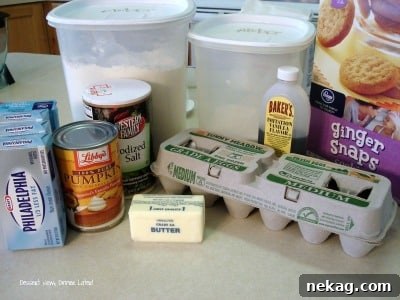 Perfect Gingersnap Pumpkin Cheesecake Minus The Cracks 3 Assorted Gingersnap Pumpkin Cheesecake ingredients, including cream cheese, pumpkin puree, and spices, all at room temperature for optimal mixing.