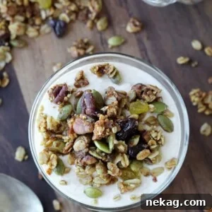 Maple Steel Cut Oats Granola Pumpkin Yogurt Parfaits, a protein and fiber-packed breakfast to keep you full.