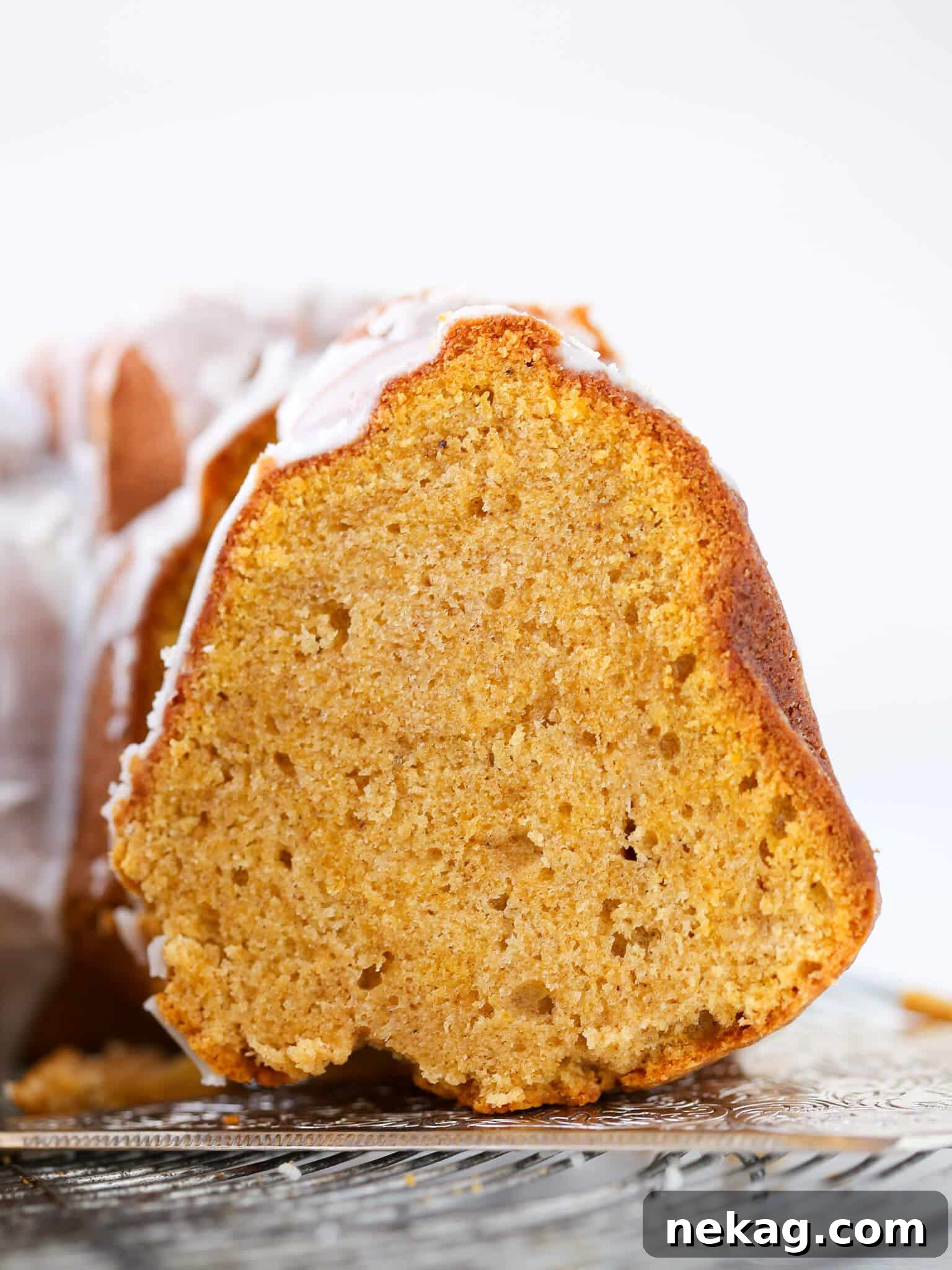 The moist and tender interior of a Pumpkin Spice Bundt Cake, revealing its beautiful crumb.