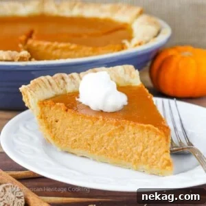 Classic Pumpkin Pie with a Twist, featuring lemon zest, spices, vanilla, and brown sugar.