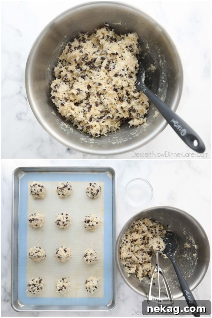 Decadent Chocolate Chip Macaroon Dreams 5 A #30 cookie scoop carefully portioning chocolate chip macaroon batter onto a parchment-lined baking sheet, showing the consistency of the mixture.