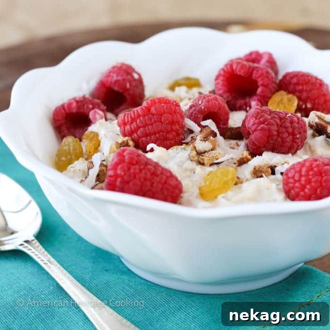 Freshly prepared Bircher Muesli with berries, a healthy and easy overnight oats breakfast