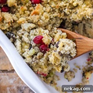 Mushroom Cornbread Stuffing baked in a white baking dish.