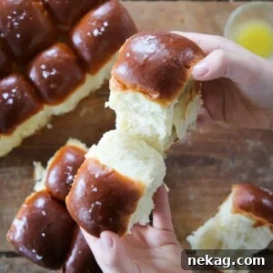 Close-up of fluffy Potato Dinner Rolls, showing their appealing texture.