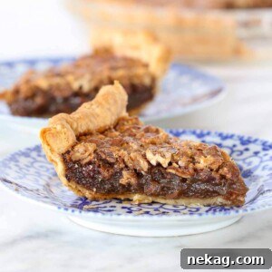 A round image of a Bourbon Pecan Pie with a golden brown crust.