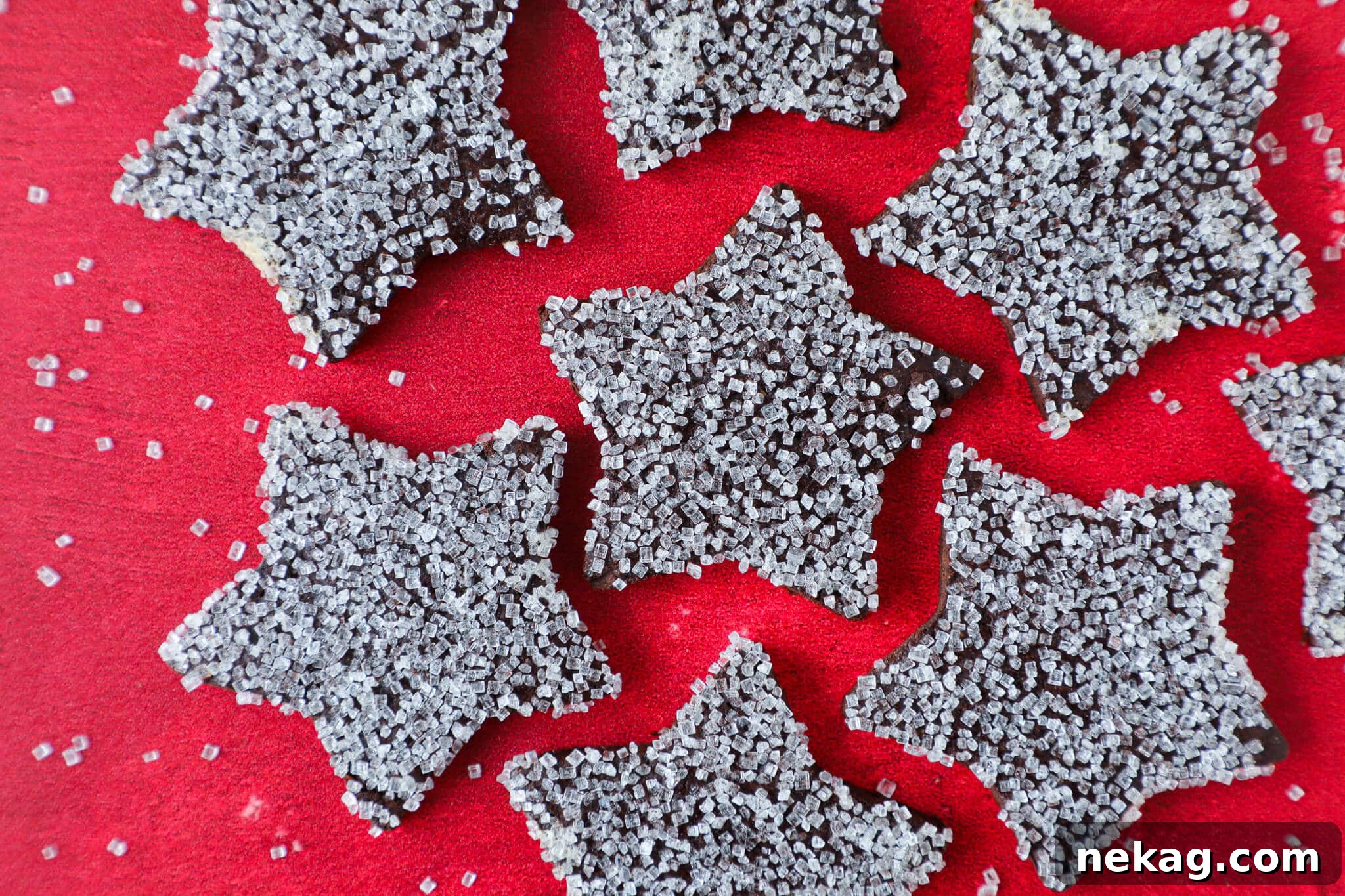 Orange-Kissed Chocolate Shortbread 6 Sparkling Christmas Cookies against a festive red background