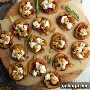 Sweet potatoes goat cheese bites with rosemary garnish.