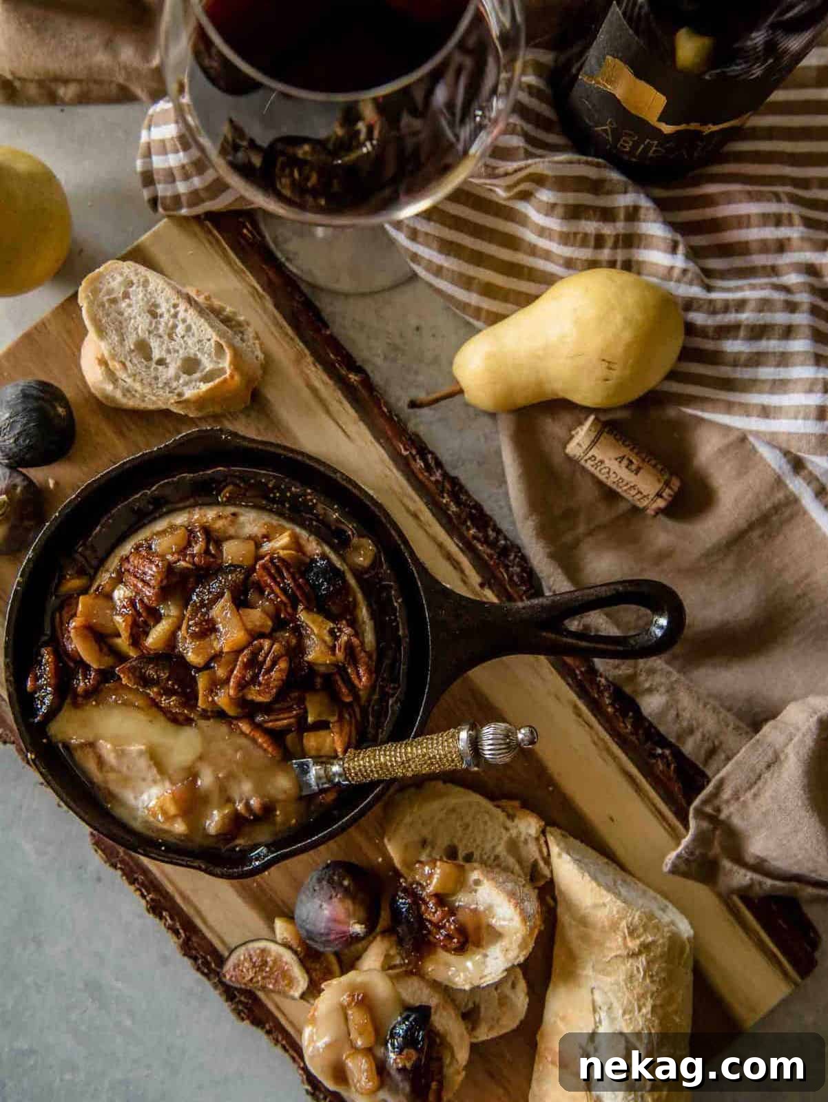 Warm, baked fig and brie in a small cast iron skillet, oozing with deliciousness.