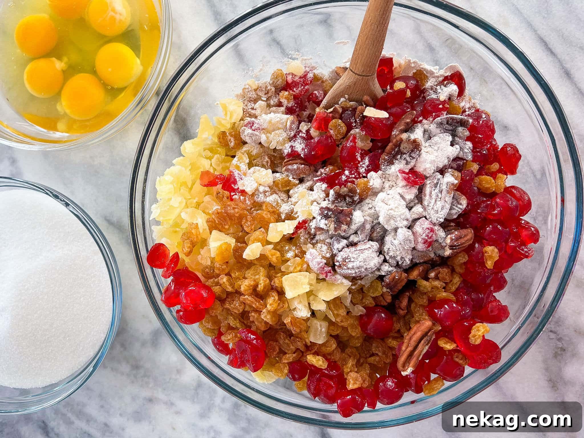 Ingredients for Fruit Cake Recipe in a mixing bowl, ready for preparation.