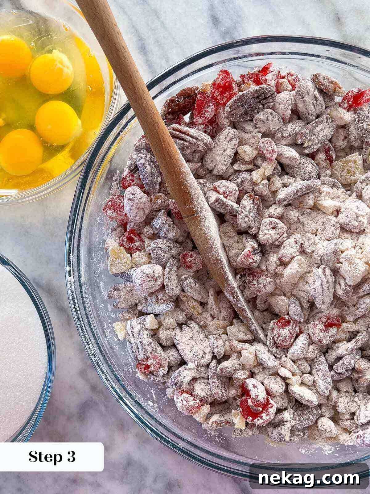 Flour-tossed dried fruit and nuts, evenly coated to prevent sinking in the fruit cake batter.