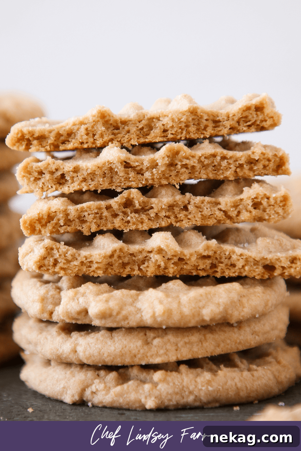 A stack of crunchy peanut butter cookies, inviting and delicious.
