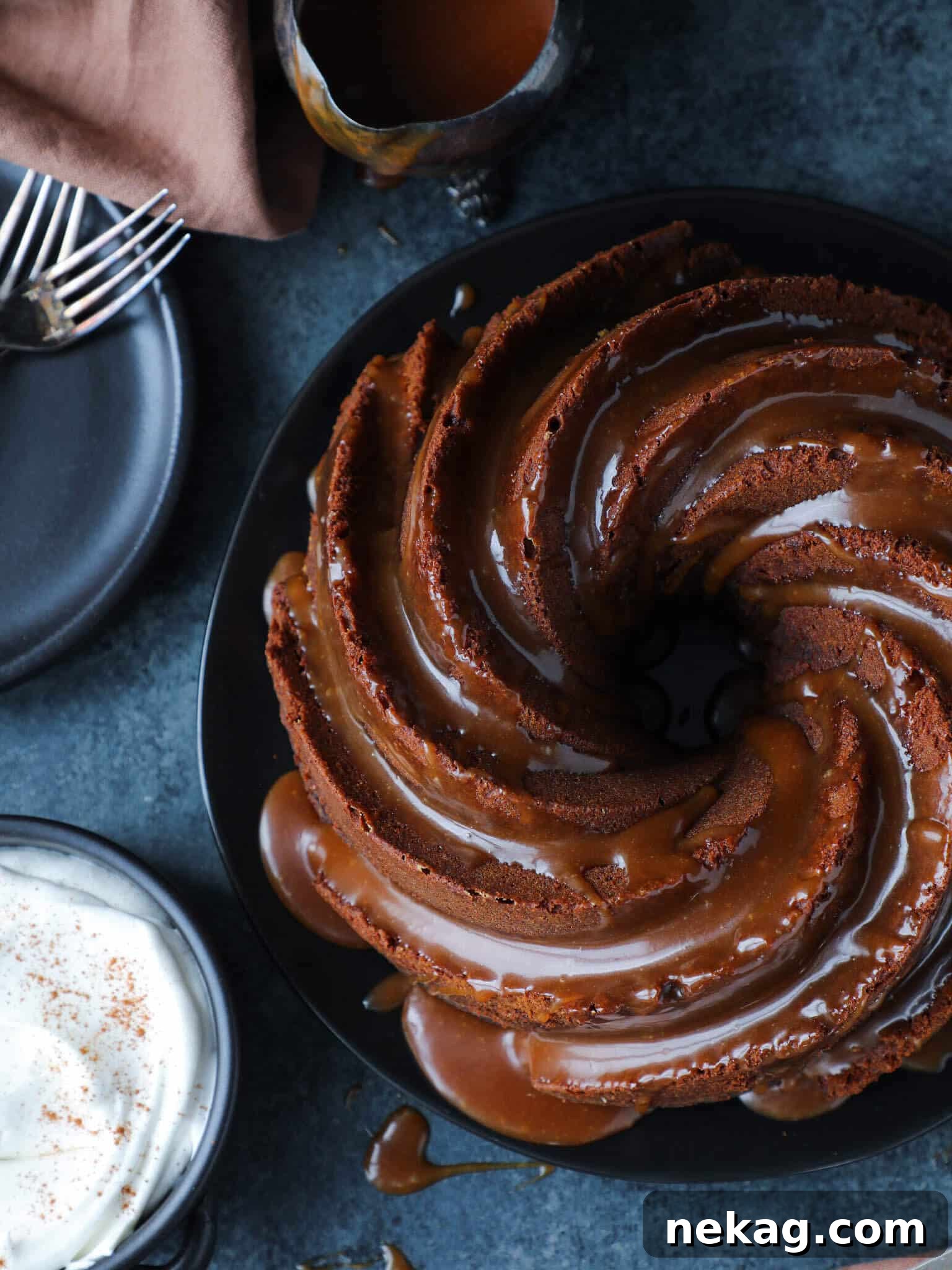 Sticky Caramel Molasses Pound Cake 7 Caramel Molasses Pound Cake in a bundt pan, adorned with a generous drizzle of caramel sauce.