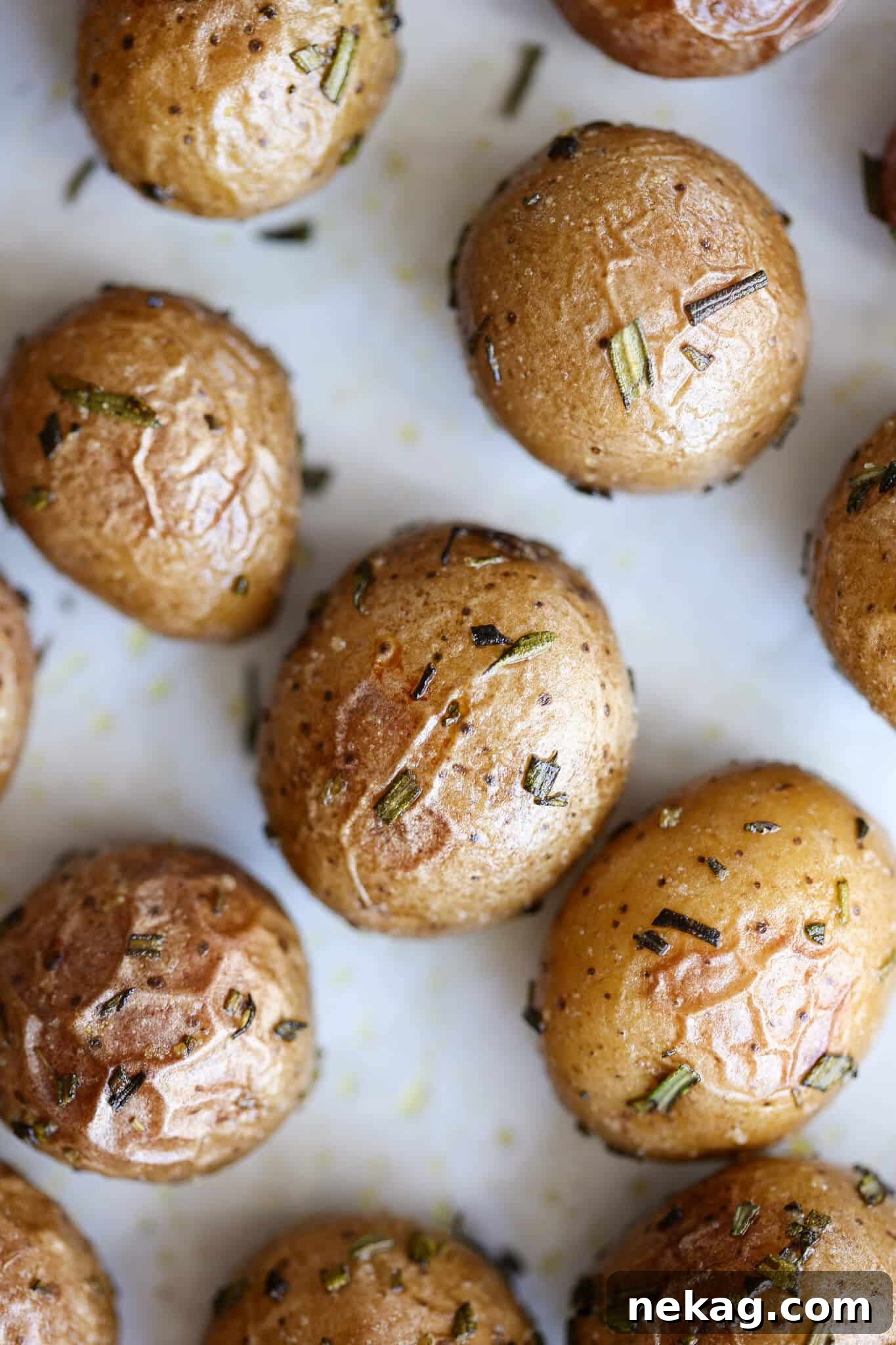 Rosemary Roasted Potatoes close up on baking sheet