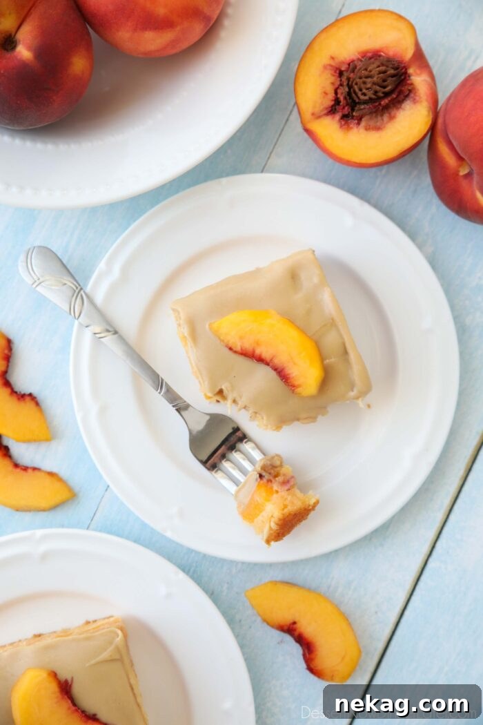 Top view of brown sugar peach cake on a plate.