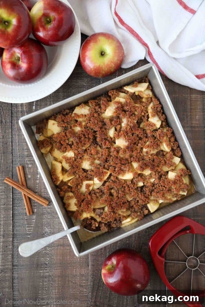 Baking dish of dessert called Apple Brown Betty. A type of fruit crisp with buttered bread crumbs on top.
